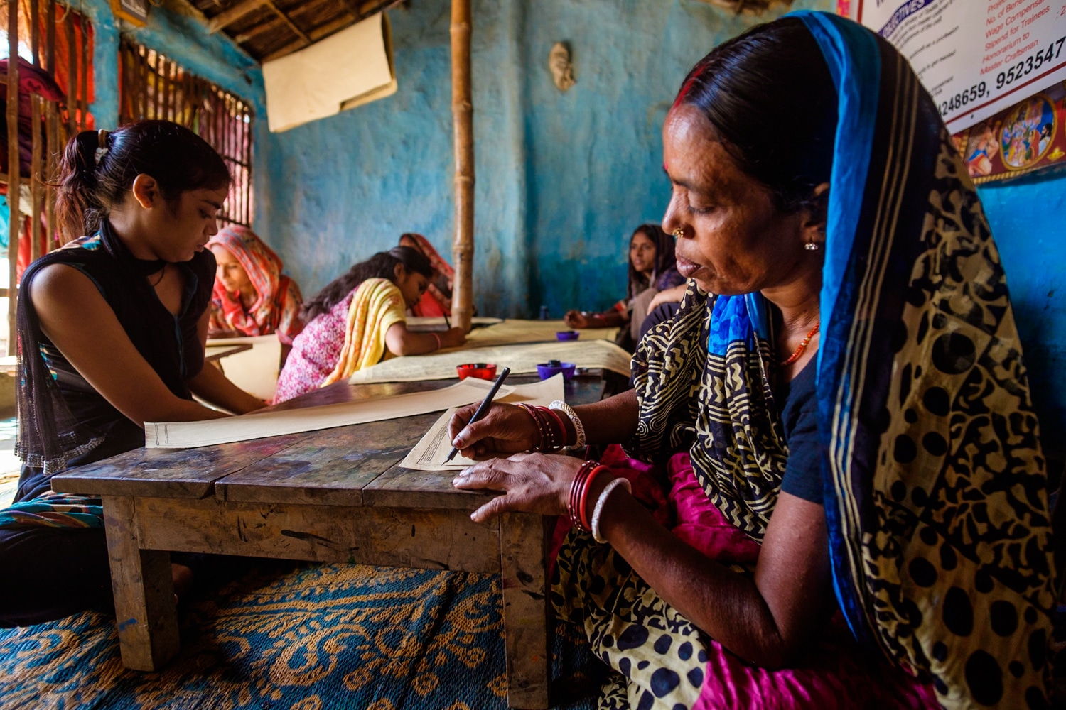 Madhubani artist at a workshop in Jitwarpur