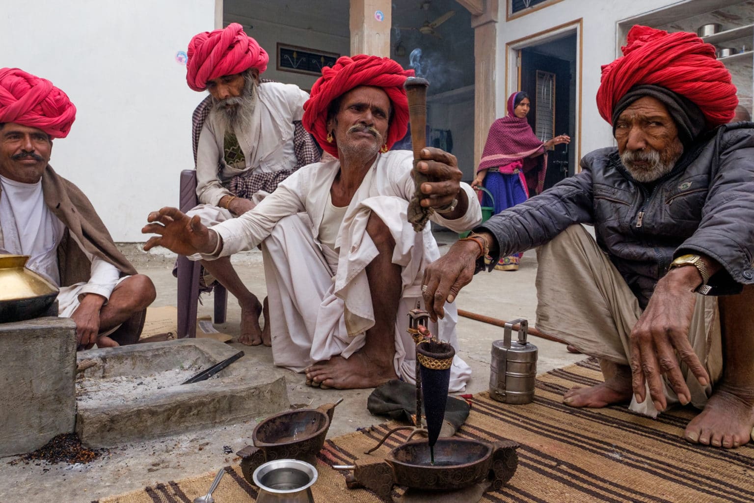 Mornings chilling with the Rabaris. That interesting looking contraption you see upfront is an opium sieve. Opium is an integral part of the culture in this part of Rajasthan, and is consumed by the Rabaris, the Bishnoi's, and back in the day even by the Rajput royals. Whilst it is often consumed on celebratory occasions, it is widely believed in these parts, that consumed in small doses, Opium aids in sleep, appetite and general well being! 
And yes, we did try some for ourselves! ;)